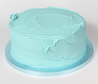Cake covered in blue buttercream