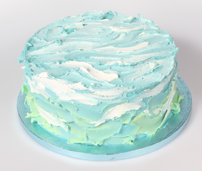 Cake covered in white buttercream
