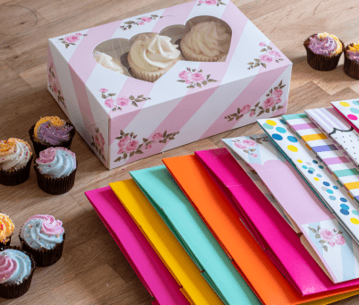 Range of colourful cupcake boxes